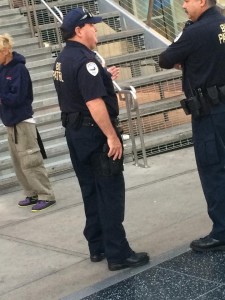 The BID patrol officer discussed in this post, his hand clearly on his gun.