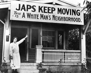 A member of the Hollywood Protective Association and spiritual forebear of the modern BID, with the backing of the 1923 edition of the Hollywood Chamber of Commerce, announces to the world that she's a moron.  Note sign in window stating "Member Hollywood Protective Association."