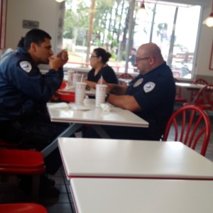 Anonymous BID Patrol officers in In-N-Out Burger at Sunset and Orange in May of this year being second guessed, questioned, and most of all, observed and surveilled.