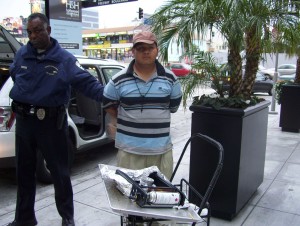 Man arrested, shackled, and humiliated by BID Patrol for selling hot dogs on the streets of Hollywood.