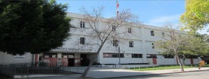 Bancroft Middle School, at 929 N. Las Palmas, is the school that Commander Beatrice wants to protect from the hordes of homeless.  Or at least we're assuming that it is.  It would be weird, though, since Bancroft is closer to Sycamore and Romaine than it is to the Rubber Stamp Building.  Maybe it's Vine Street School?  But that's kind of silly, since it's about 3000 feet from Vine Street school to Sycamore and Romaine, whereas it's 2100 feet from Vine Street School to the Rubber Stamp Building.  900 feet is a deal-breaker?