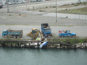 The city of San Francisco sends multiple trucks and a freaking backhoe to remove a homeless encampment in November, 2009.  In Los Angeles, we gotta ask ourselves, do we wanna be like these gol-durned Frisco-ites?  We don't think so!