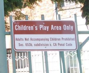 Close-up of former sign in Selma Park falsely claiming it to be a "Children's Play Area Only."