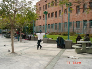 Selma Park in April, 2007, after it became a target of the BID but before they opened fire.  We have no hard evidence yet, but we'd say that this photo of a man dancing happily in the park was intended to depict the kind of thing that must be STOPPED!