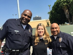 Darrell Davis (right) with Bea Girmala and LaMont Jerrett in the parking lot of the Hollywood Police Station on Wilcox