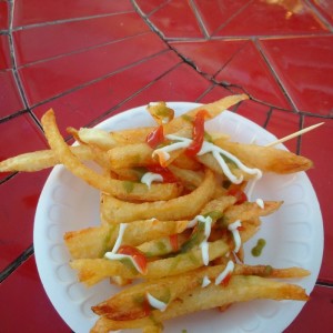 Potatoes fried to order at the MacArthur Park Red Line station yesterday afternoon.  I don't even like French fries, and I could have eaten any number of orders of these.