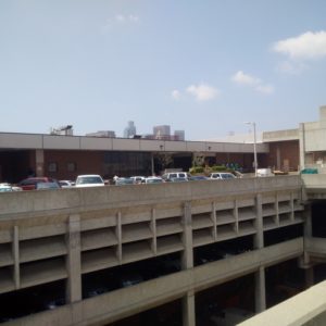 The view from Ramirez Street.  The entrance to the Archives is by the loading dock in the mid-right area of the image.