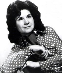 The hallowed Kitty Wells.  Seriously, listen to the song!